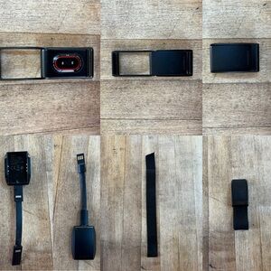 WHOOP 3.0 Fitness Tracker with black strap and charger